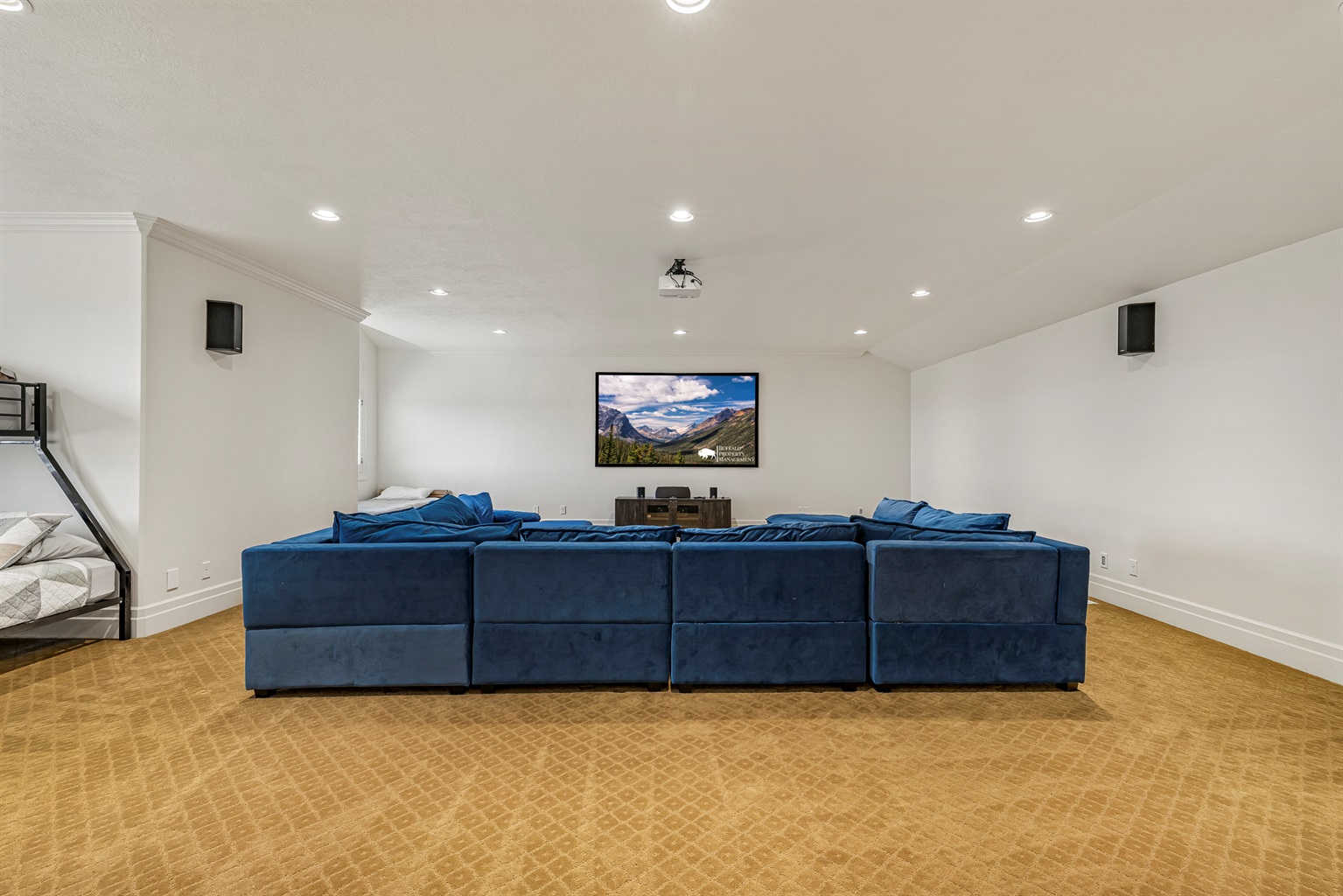 Spacious theater lounge for movie nights, family fun, and unforgettable memories.