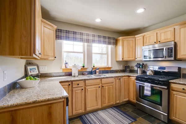 Fully stocked kitchen with gas stove