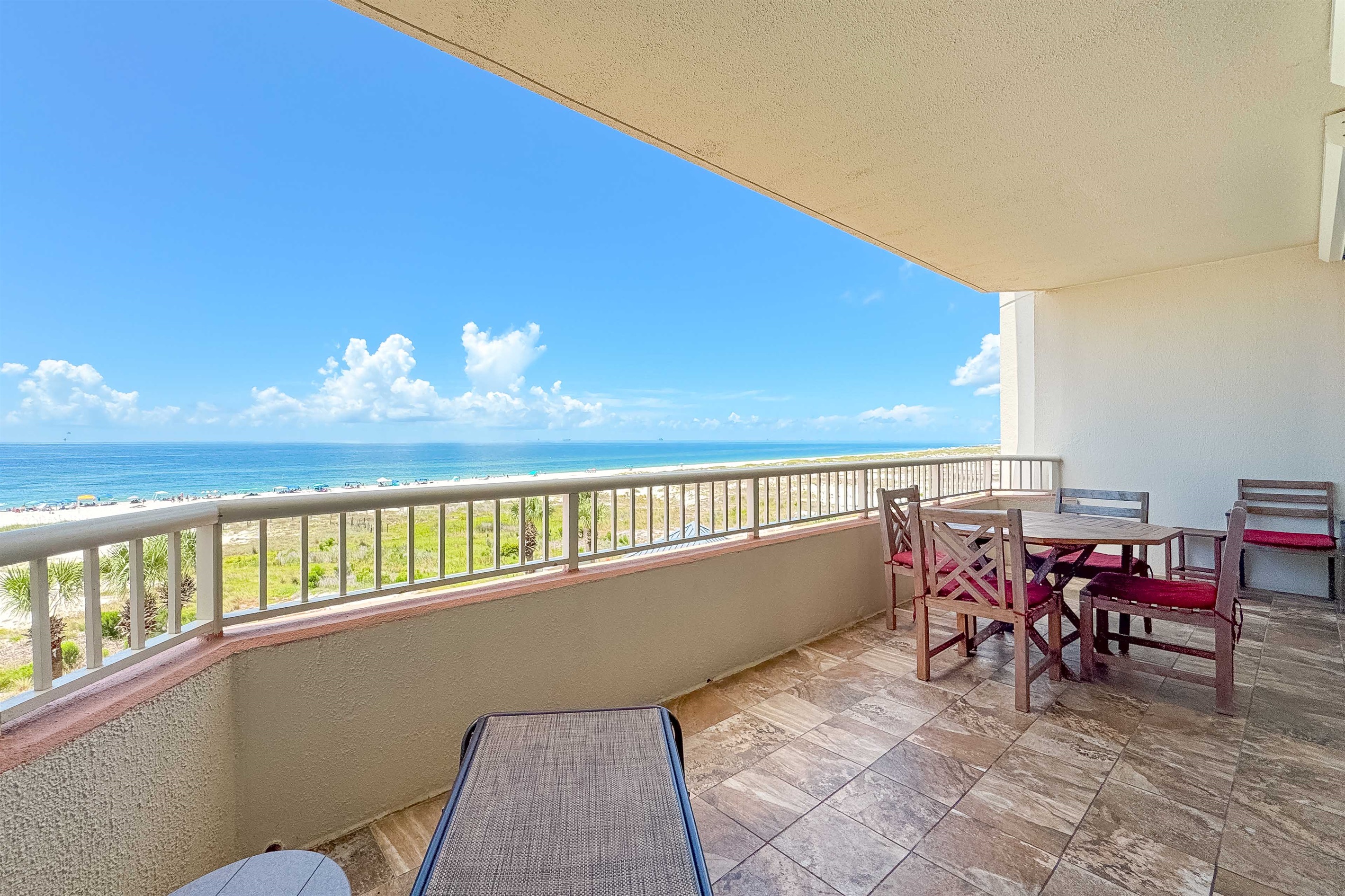 Coastal-inspired decor enhances this peaceful reading or relaxation spot, with the allure of the ocean just steps away.