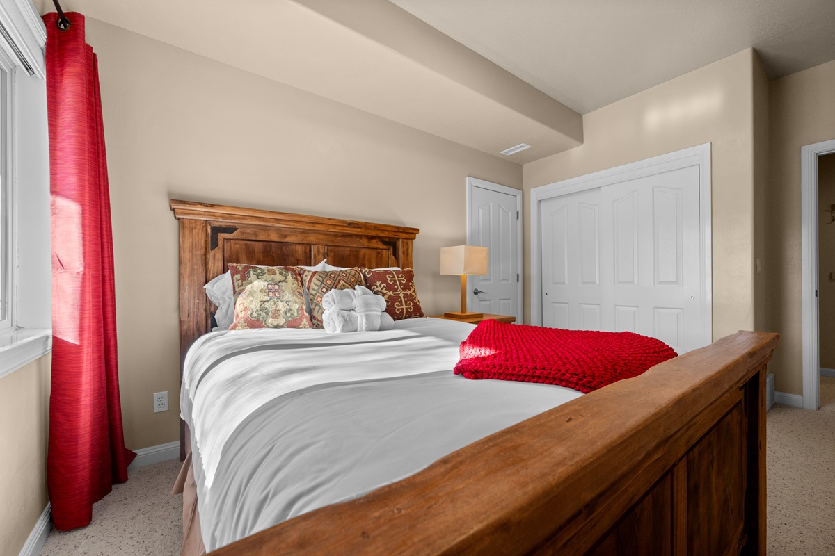 Comfortable queen bedroom retreat designed for peaceful mountain stays.