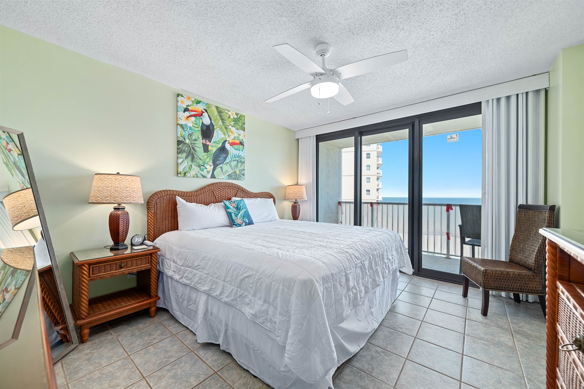 Step out onto your private balcony and enjoy the fresh sea air. This primary bedroom features a comfortable KING bed and a flat-screen TV for your enjoyment.