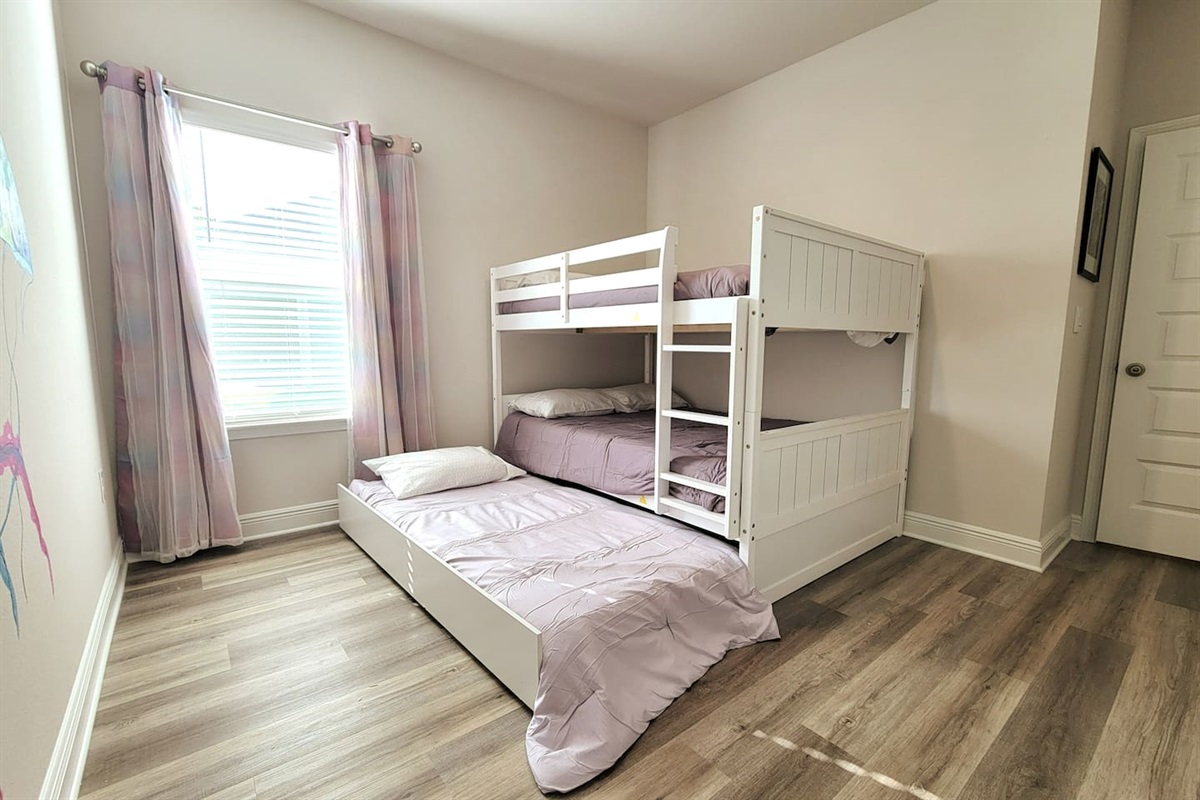 The bunk room! Full-over-full bunk bed with a twin trundle.