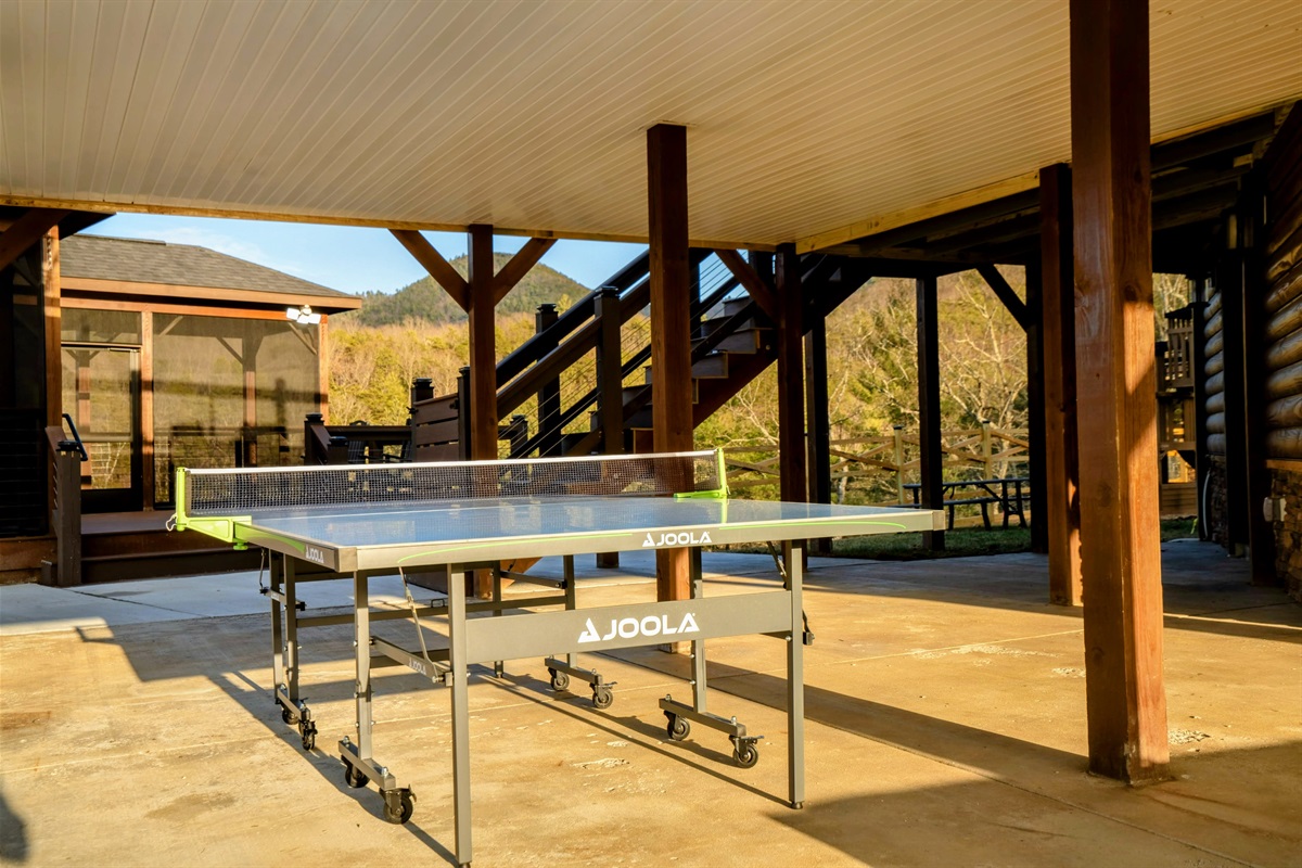 Game Time – Stay active and connected with outdoor ping pong, surrounded by scenic mountain views.