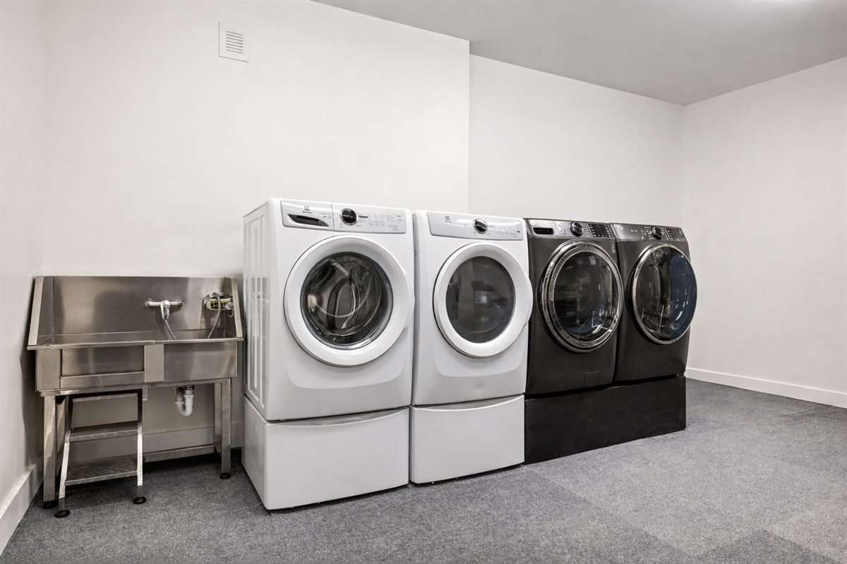 {Laundry} Refresh everything in one go — two full washer/dryer sets keep groups moving, while the dedicated dog wash station makes post-adventure cleanups quick and easy.

