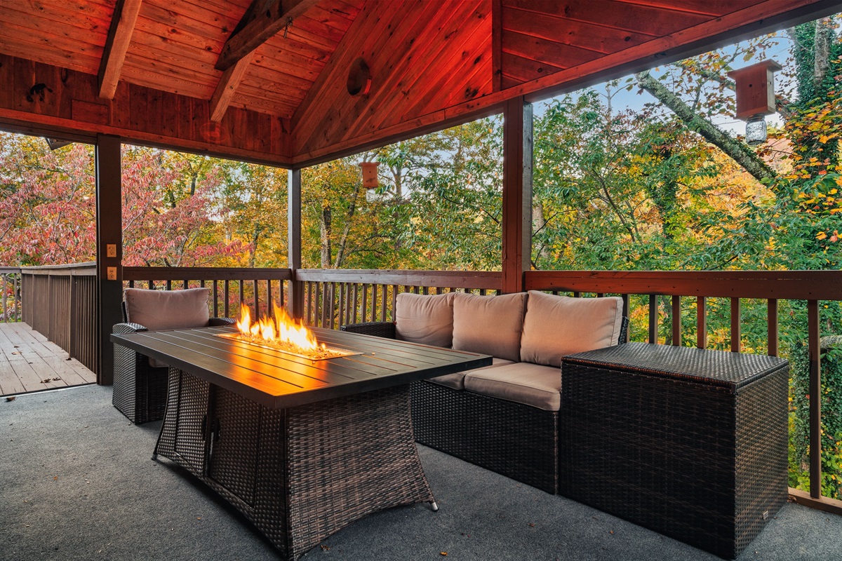 Secluded, covered deck with firepit