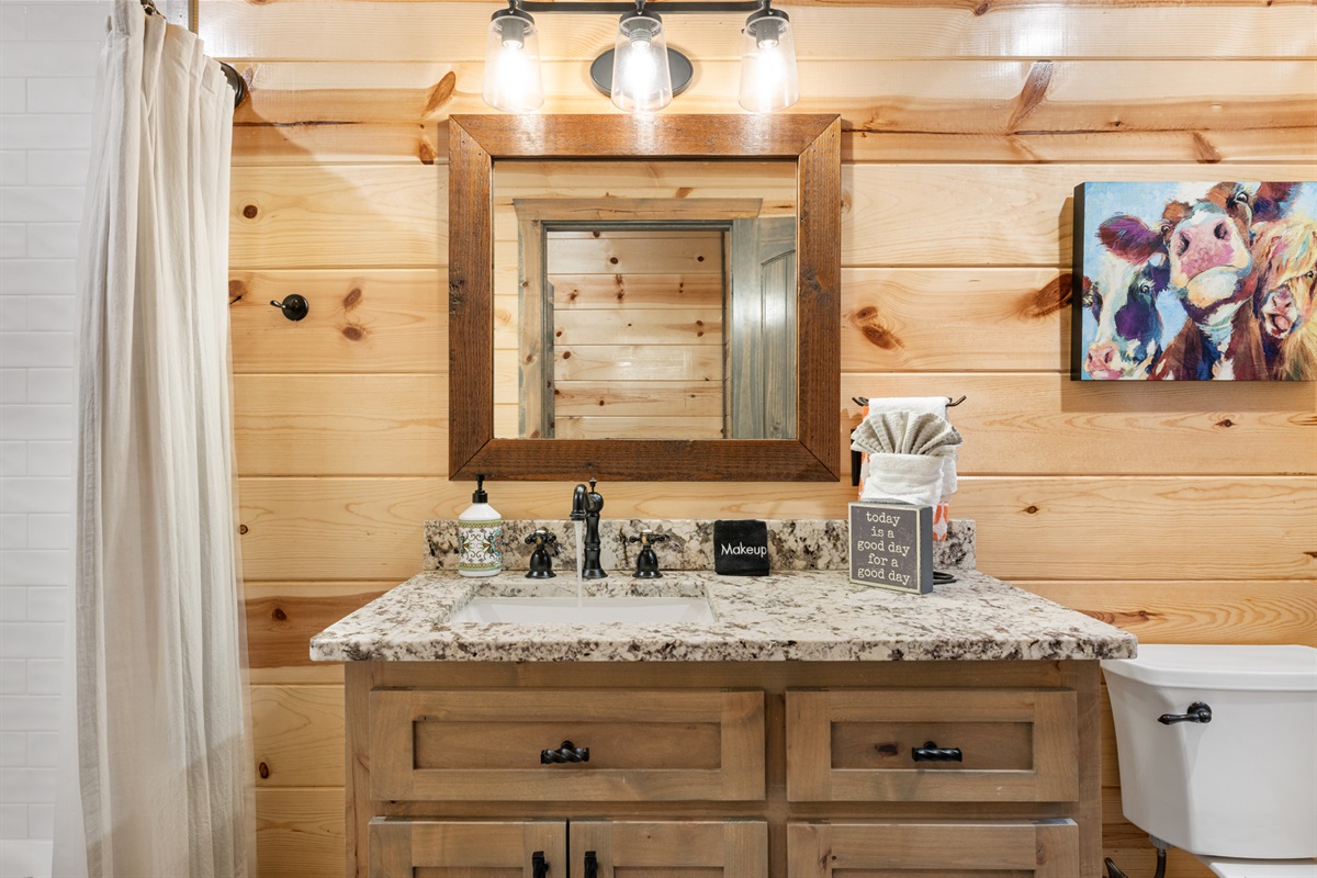 Rustic bathroom vanity with charming cabin-inspired details