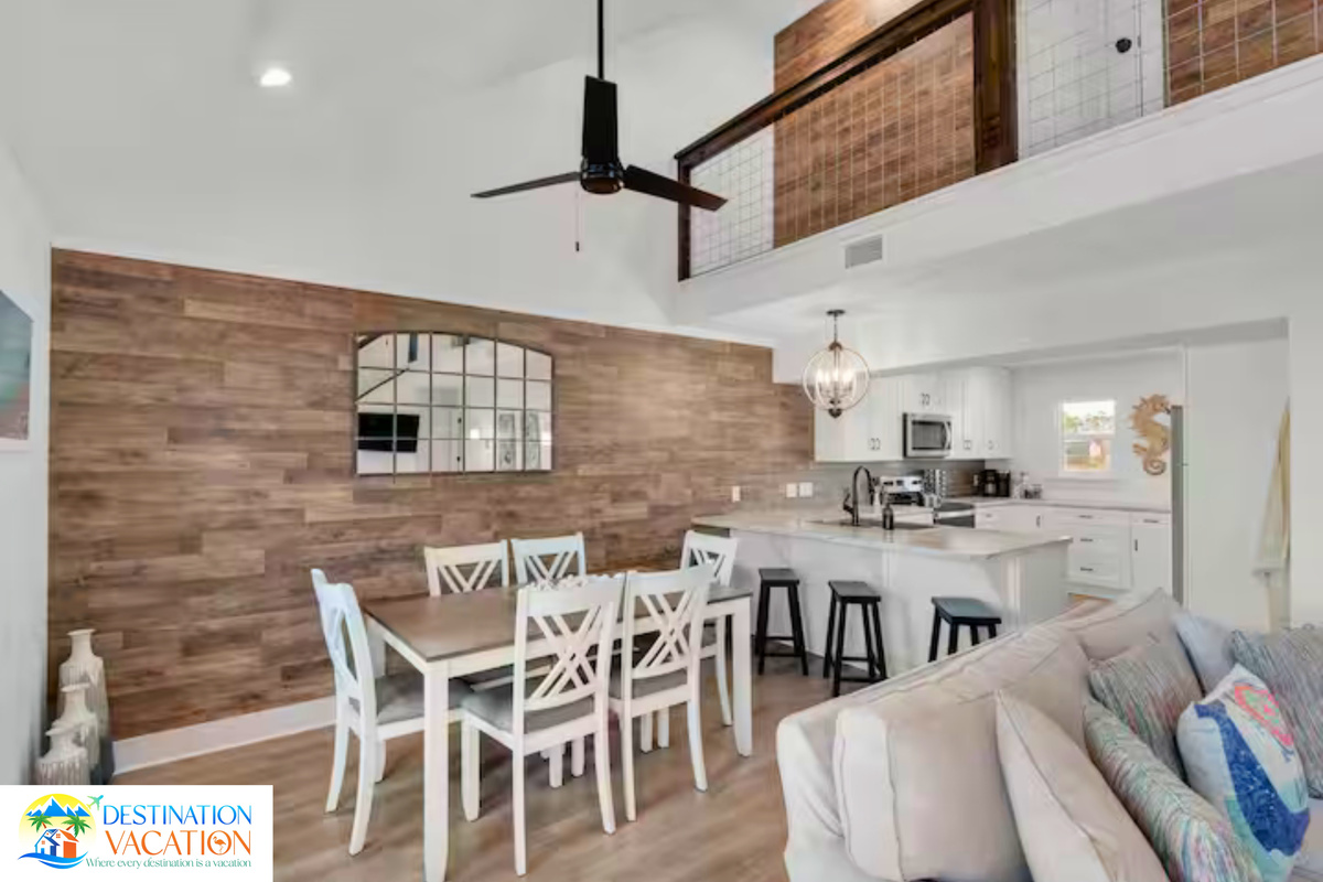 Open dining area brings everyone together with coastal style.