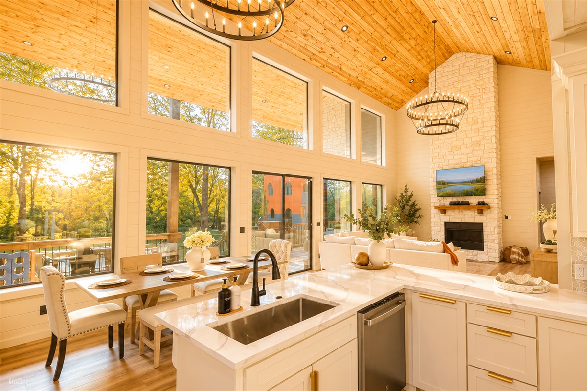 Open Concept Kitchen-Dining: Stunning views paired with elegant decor for unforgettable gatherings!