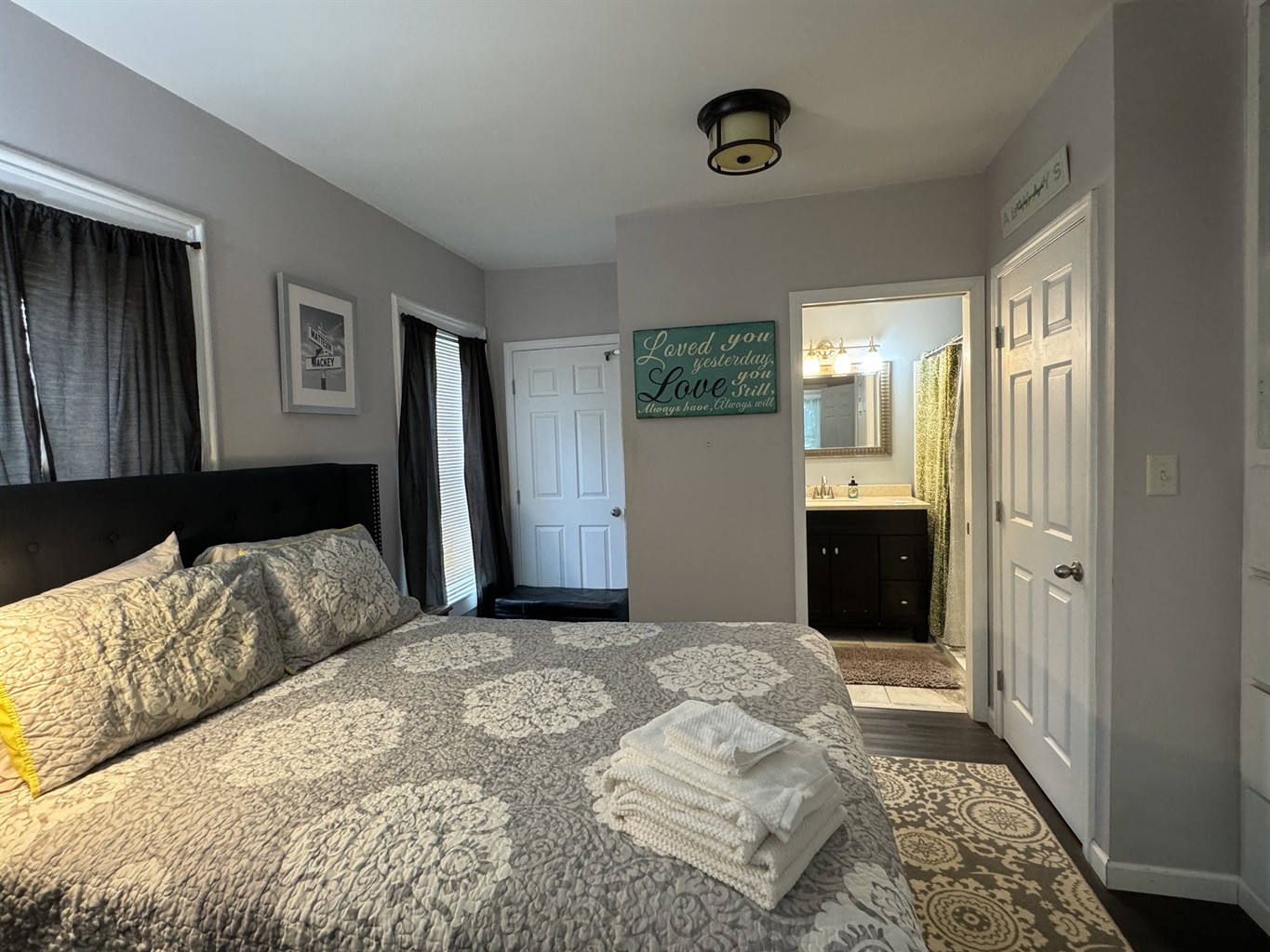 1st floor primary bedroom with king bed and ensuite bathroom