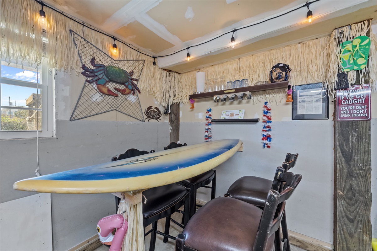 Large garage area with beach gear and storage space