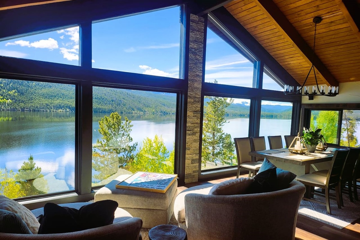 Come take in the 180* unobstructed indoor lakeside mountain views that you can enjoy year-round!