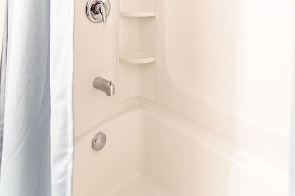 Full bathroom with modern fixtures and a clean, contemporary design.