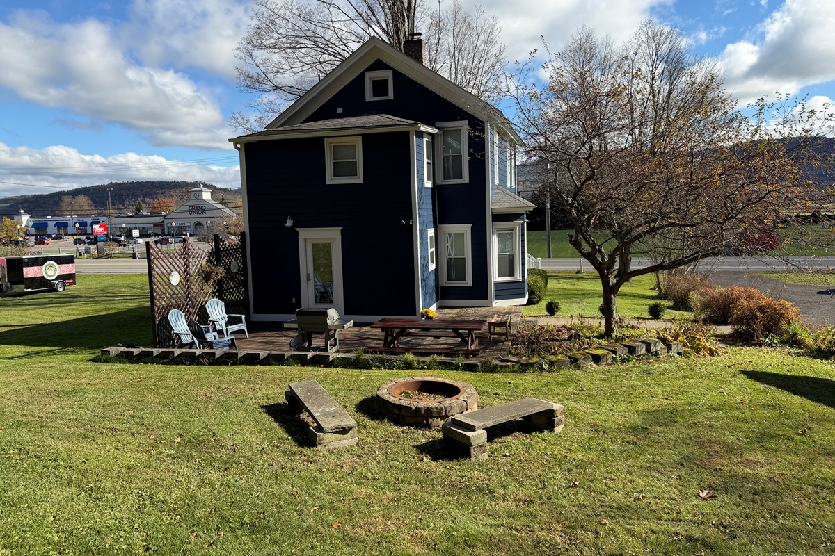 Fire pit area behind the house.