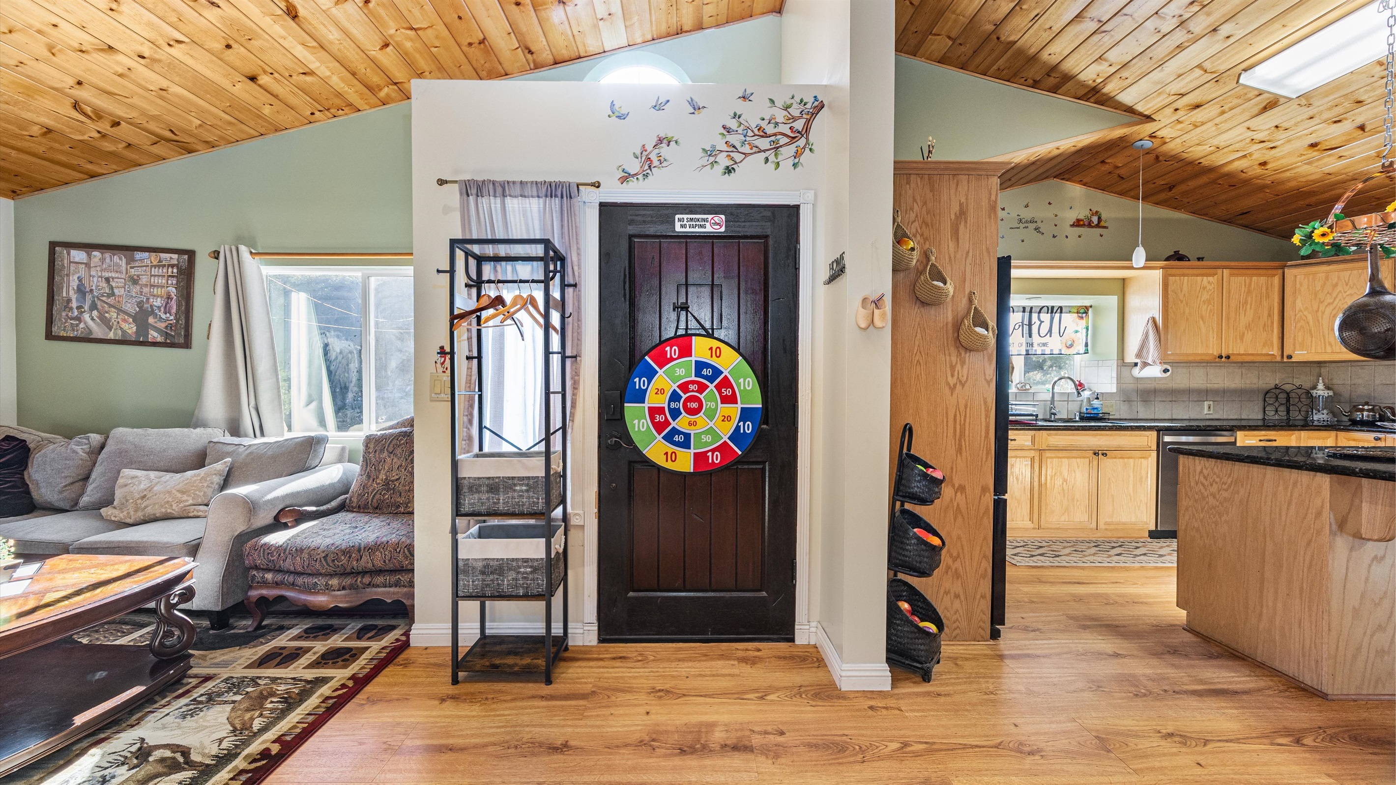 Large windows flood the living room with natural light and frame truly breathtaking views.
