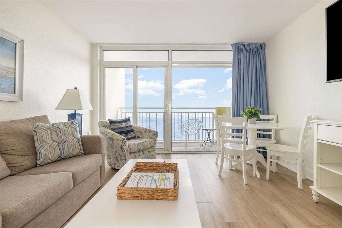 Oceanfront Living room with balcony access