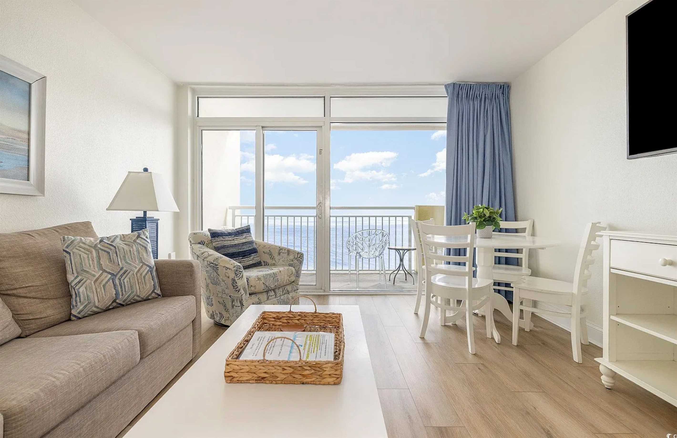 Oceanfront Living room with balcony access