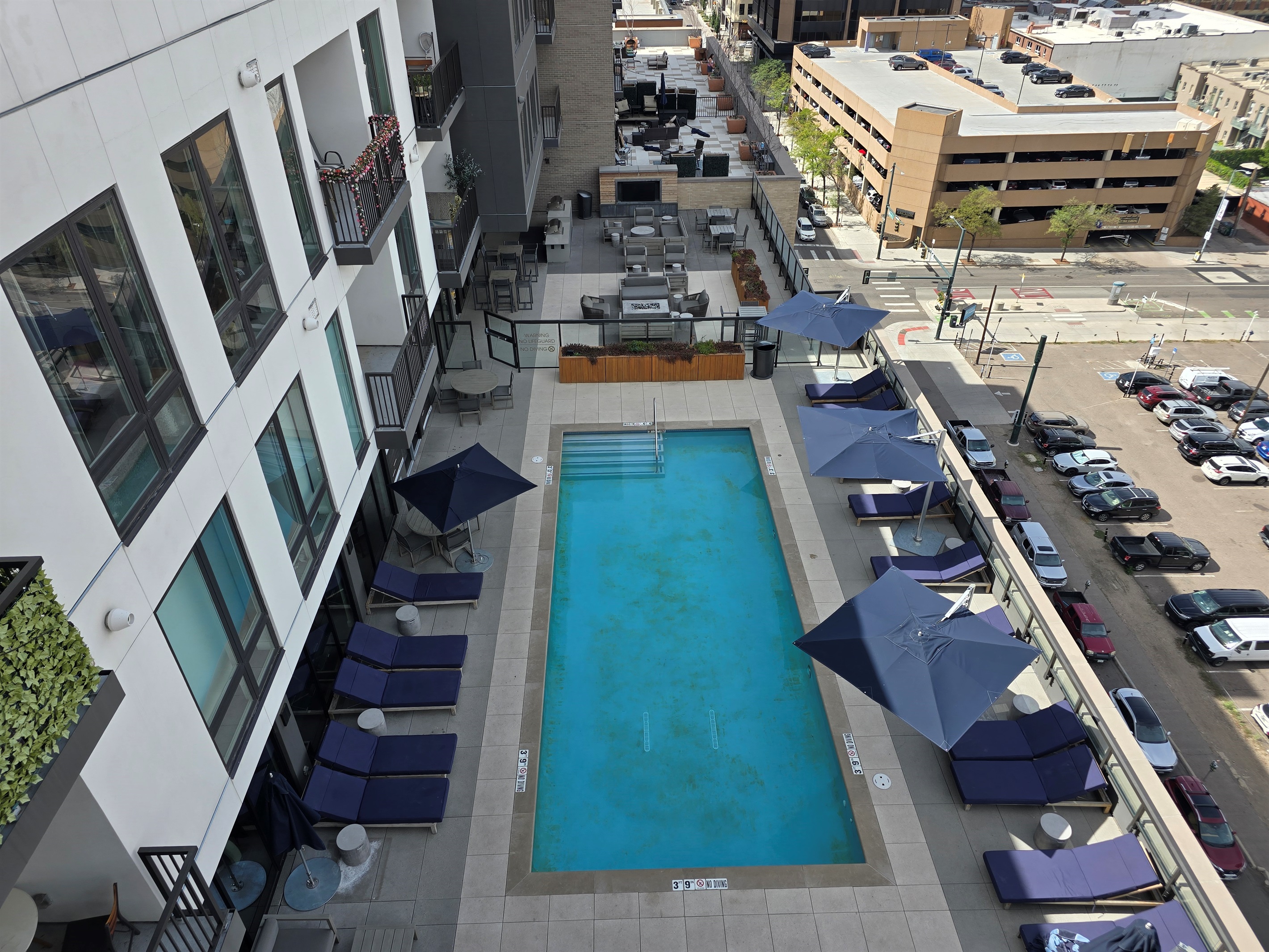 View of the pool area from the private balcony off of the main bedroom