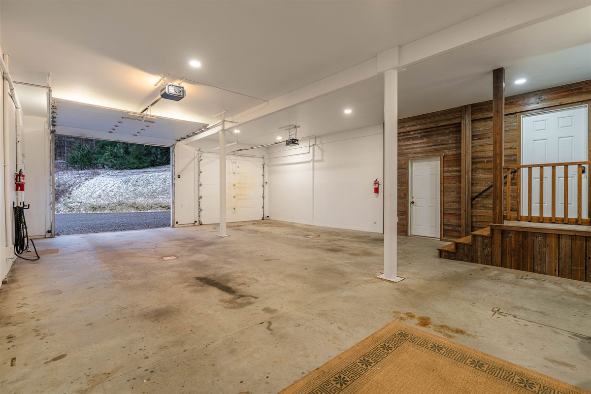 Spacious 2-car guest garage with easy access for gear and luggage.