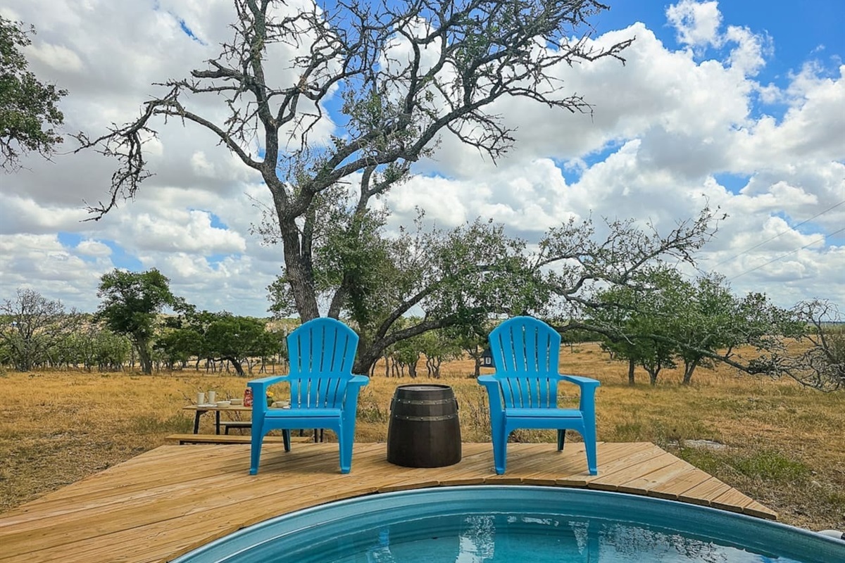 Unwind by the pool in comfortable Adirondack chairs while soaking in the Texas sun.