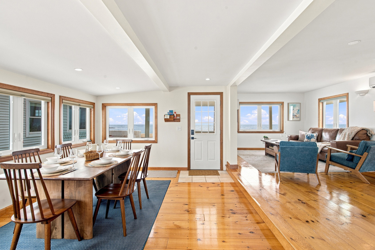Open-concept living, dining, and kitchen area with plenty of space to gather and enjoy the view.