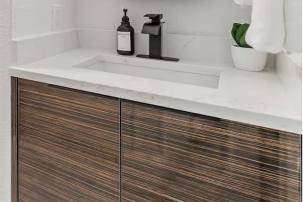 This stylish bathroom is perfect for pampering and unwinding in style. Featuring premium towels, shampoo, conditioner, hand soap, and body wash