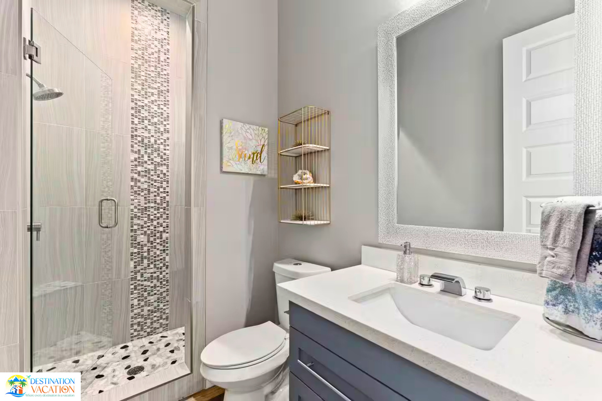 Clean lines and elegant finishes define this bathroom oasis.