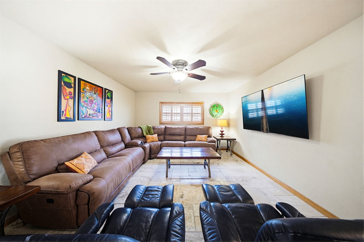 Enjoy the large 75" living room TV.