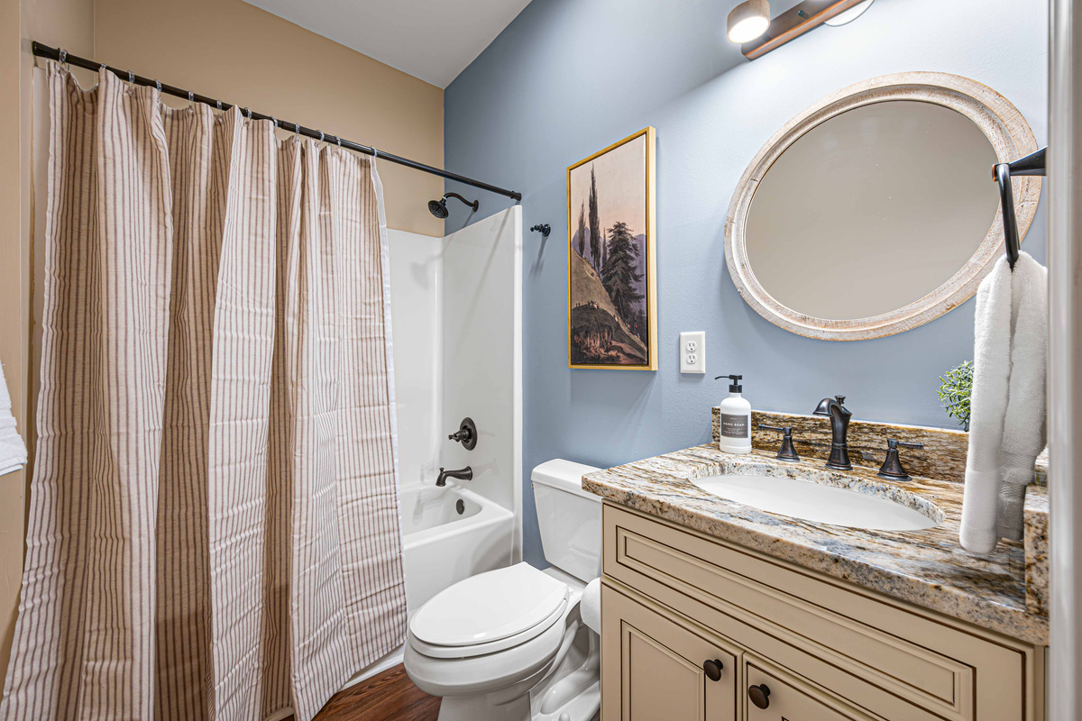 Second bathroom with tub/shower combo.