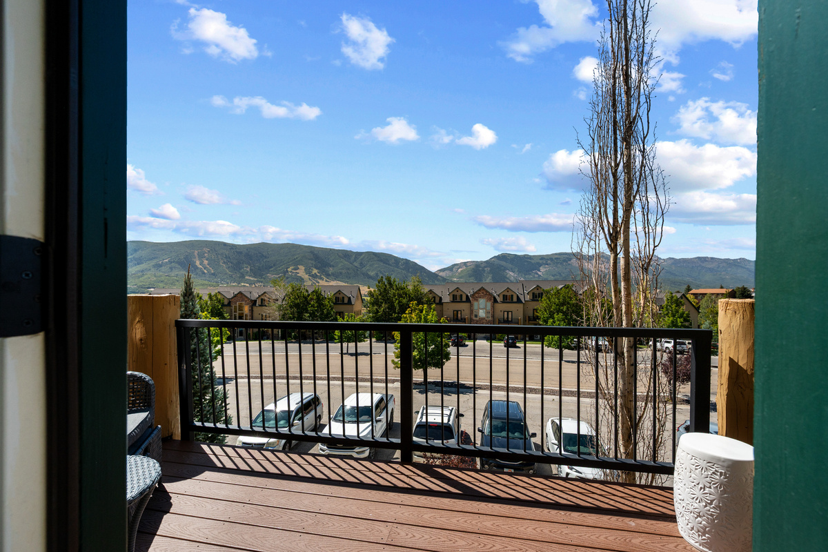 Start the morning outside with crisp mountain air and scenic views just beyond the railing.
