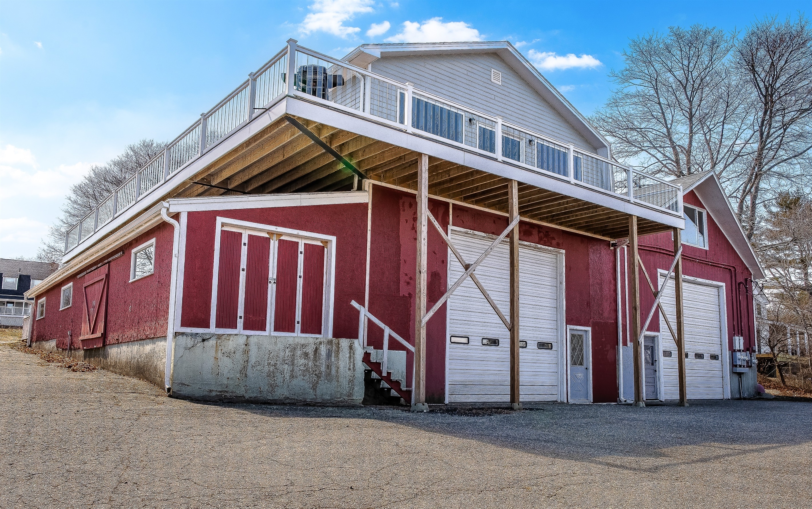History preserved. The Aerie sits atop a historic maritime plant—complete with its original lobster float tank, packing facility, and boat shop. We’ve kept the exterior authentic to its "Quiet Side" roots while rising "back from the ashes" inside.