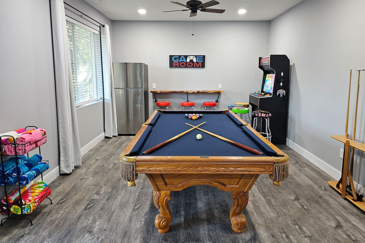 Game room with pool table for friendly family competition.