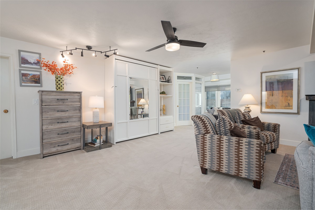 Large living room, easily fits murphy bed without moving furniture.