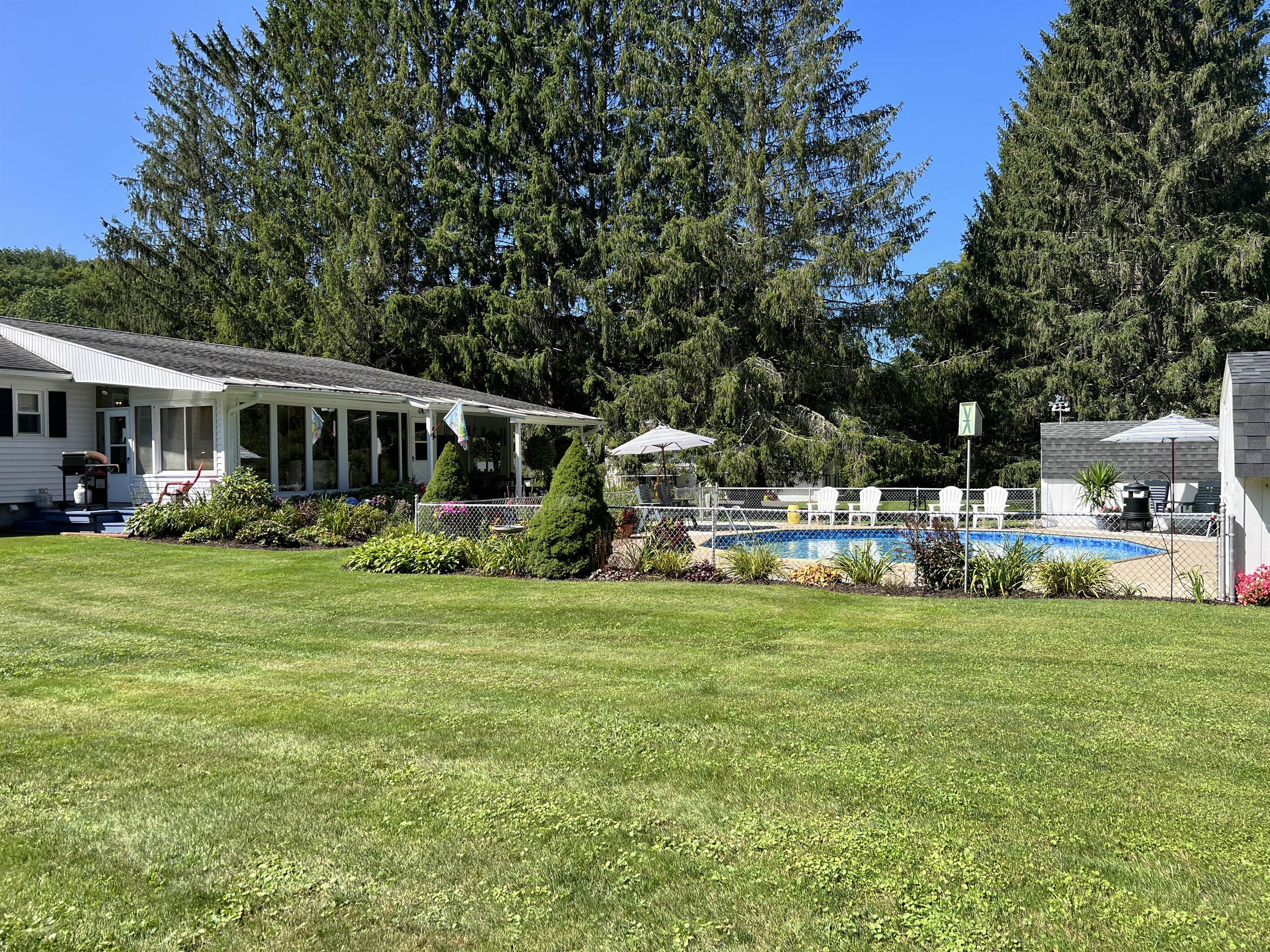 Meticulously kept grounds surrounding the pool