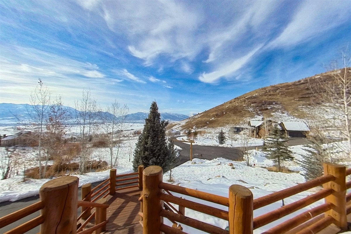 Winter views from the deck—peaceful and picturesque. Views of the  expansive driveway.