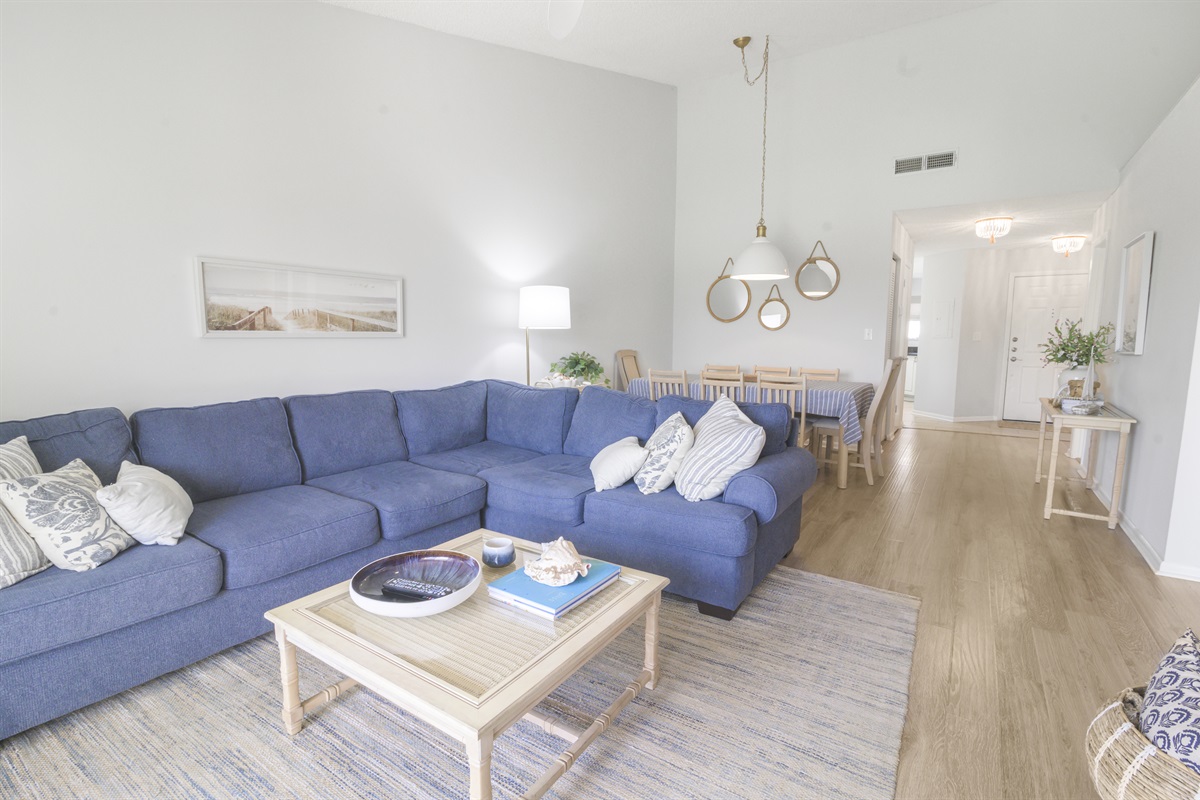 Spacious and sunlit, the living room is ideal for unwinding, streaming your favorite shows, or enjoying quality time together.