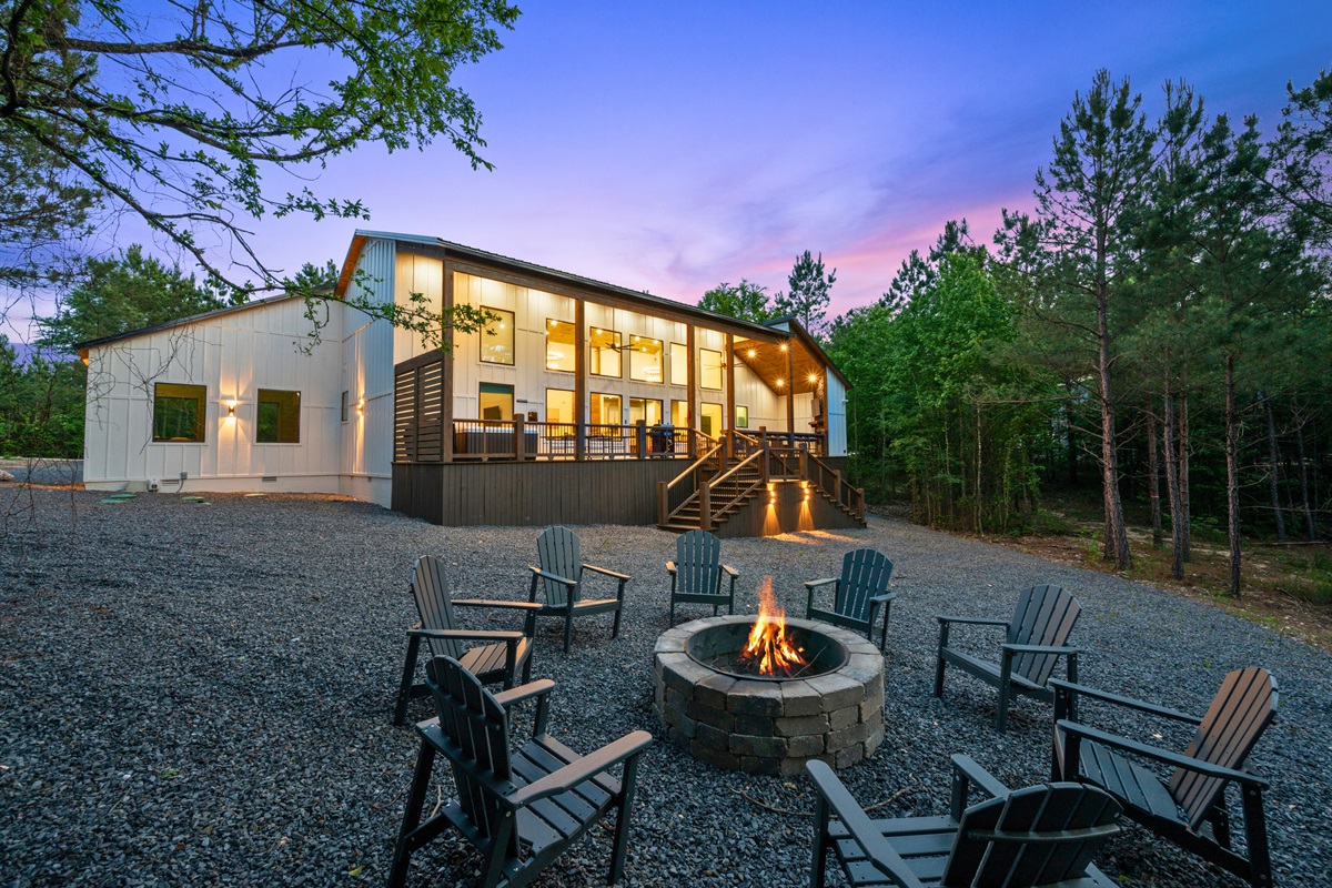 The spacious backyard gives everyone room to spread out, play outdoor games, and enjoy the natural beauty that surrounds the cabin.