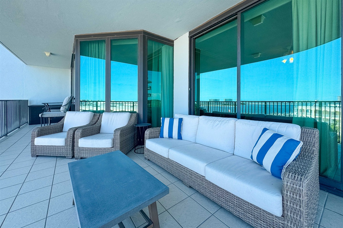 Where the sky meets the sea.  This expansive balcony provides a front-row seat to nature's most spectacular show.  Unwind and recharge in this idyllic setting.
