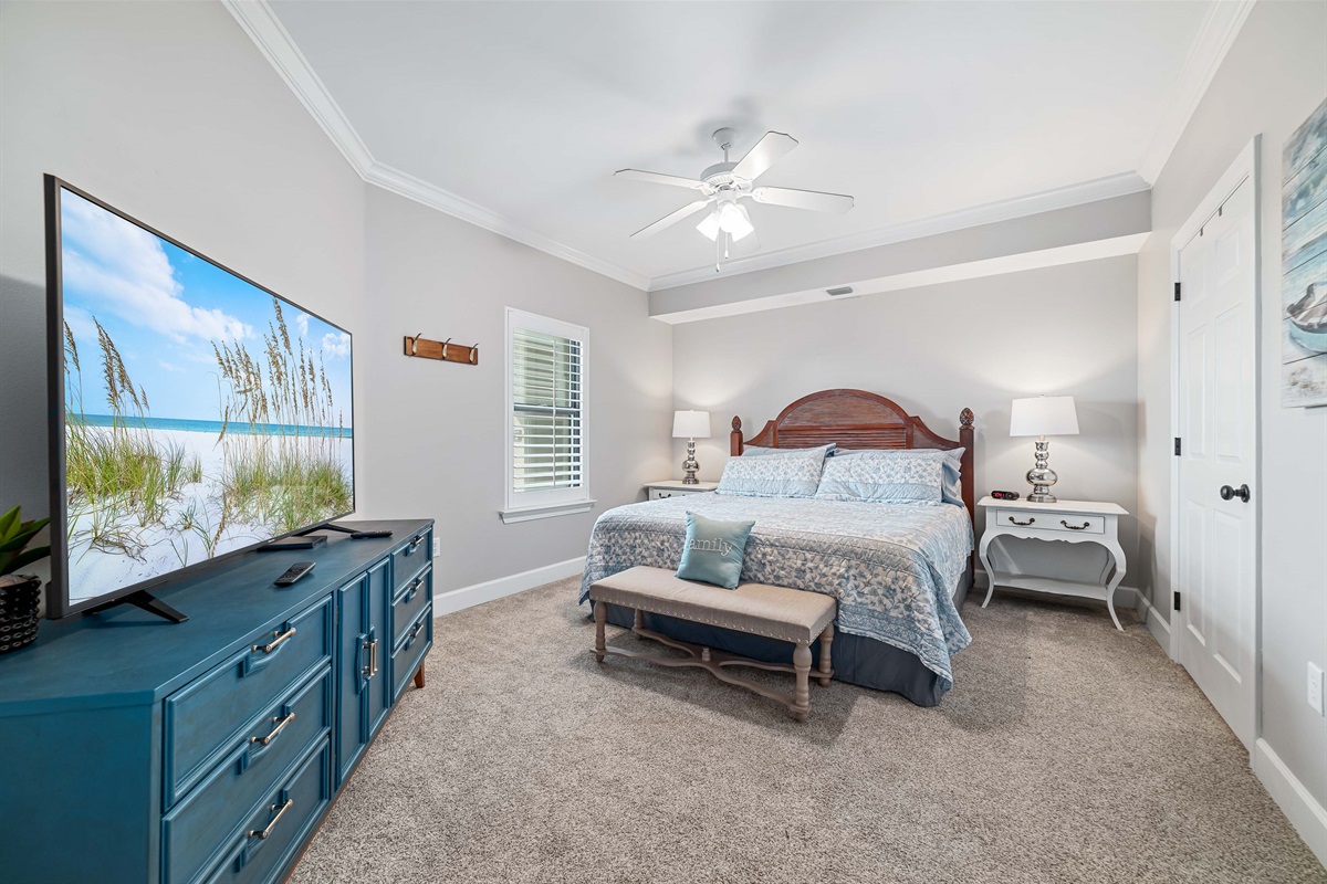 A tranquil bedroom retreat, bathed in natural light and designed with a soothing coastal palette.