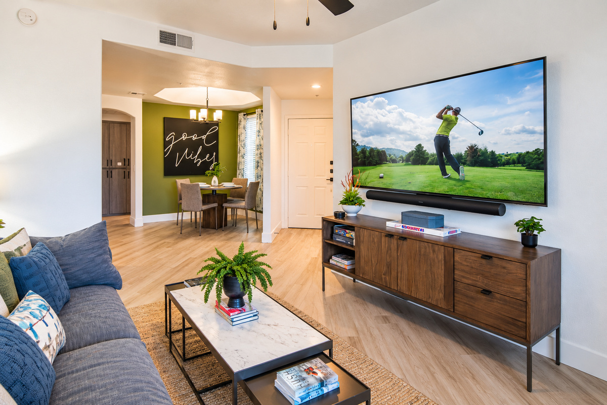 - Spacious open layout blends dining and living areas seamlessly   - Modern decor, bright light, and “Good Vibes” art set the mood   - Ideal for group stays or cozy evenings at your home away from home