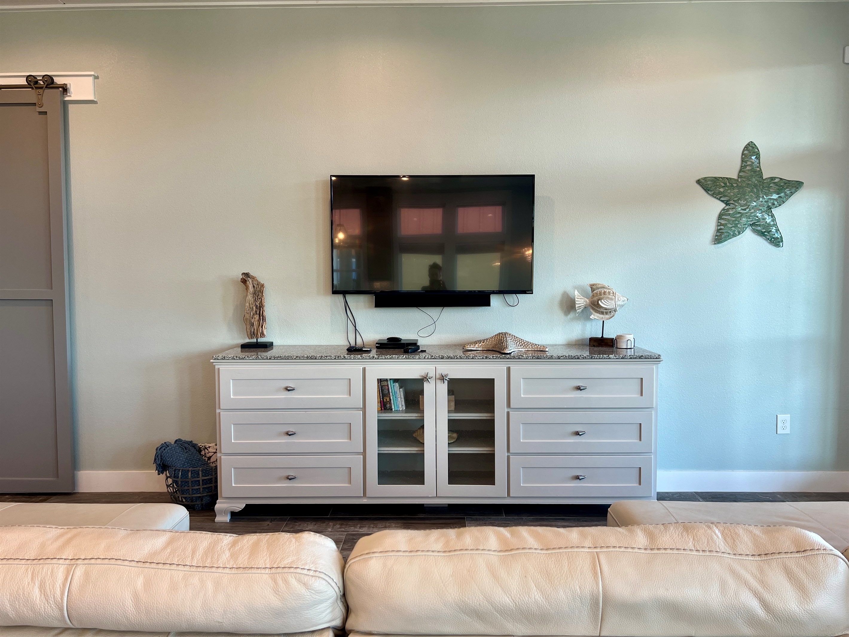 Crystal Paradise Living Room: Stylish living area designed for relaxation and entertainment with family or friends.”