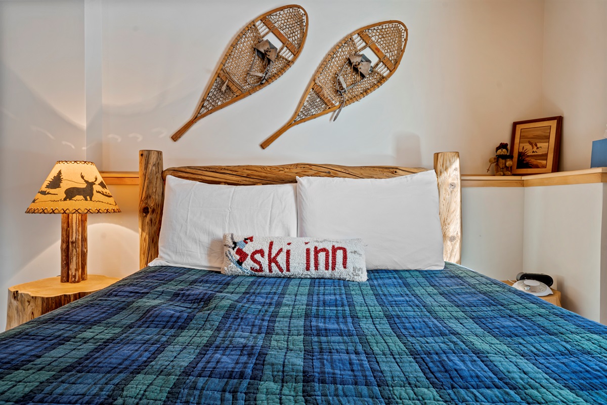 Relax in the basement’s comfortable Queen bedroom, perfect for extra guests.