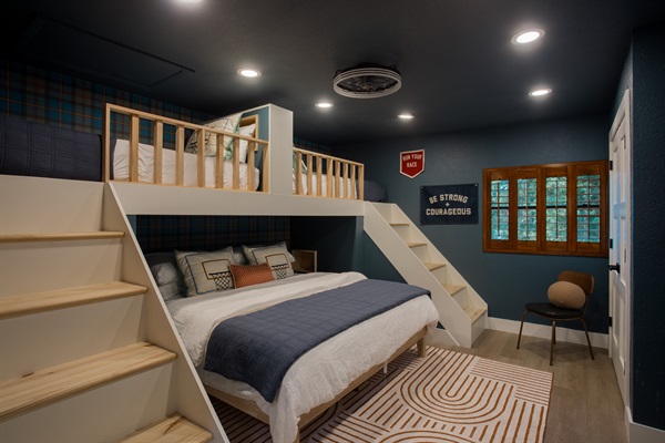Welcome to the bunk room, our 3rd bedroom, is our custom built in double twin over king bunk suite. Twin beds have a headboard separating the two for privacy and separate stairs to bed. 