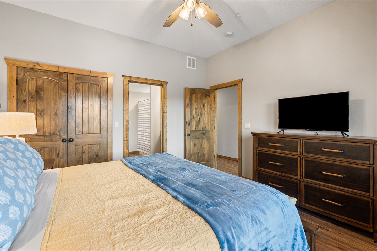 King bedroom downstairs adjoins with Jack and Jill bathroom with a tub combo