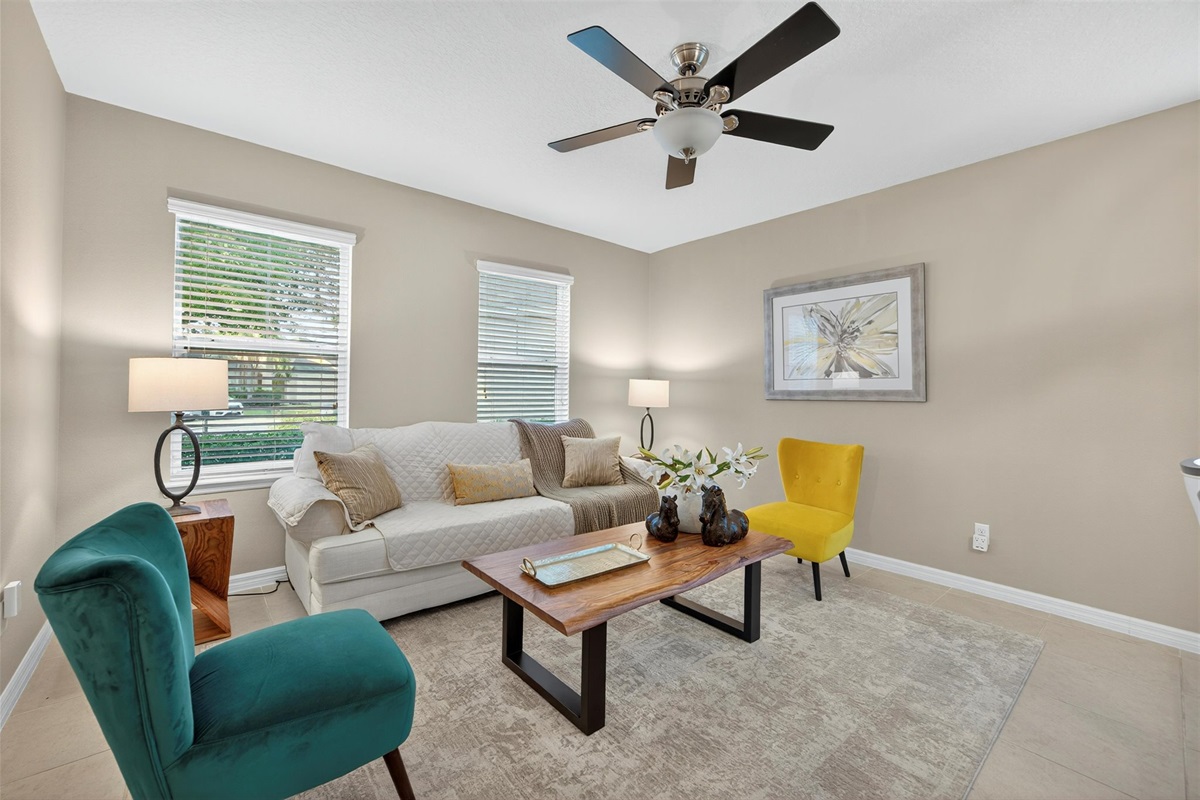 Spacious open-concept living area ideal for family movie nights or planning your park day.