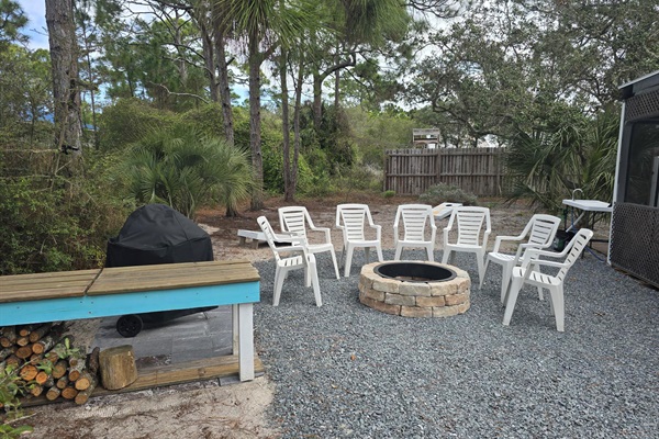 Fire pit, 26" Weber grill, corn hole - all in the back yard