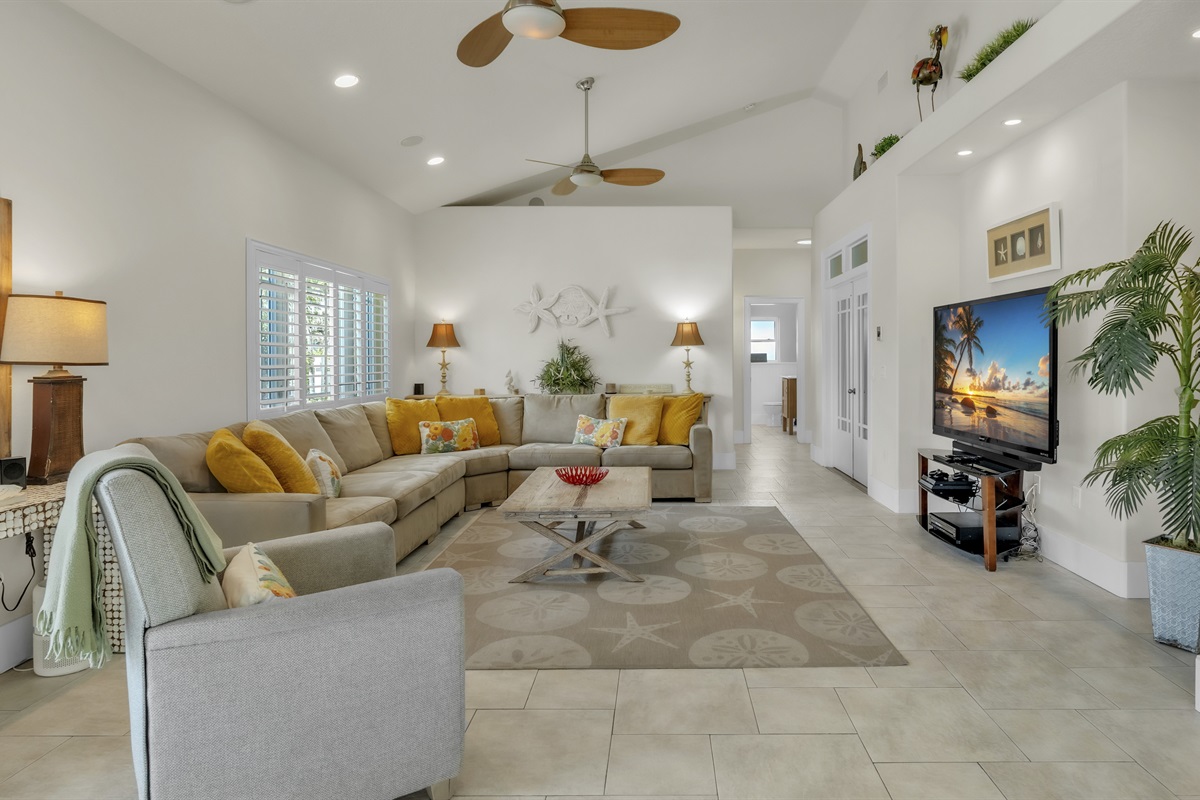 Bright living room with comfortable seating – AMI Beach House, Holmes Beach