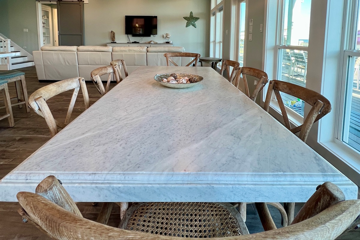 Crystal Paradise Kitchen: Bright kitchen with luxurious marble surfaces and generous 8-seat layout.