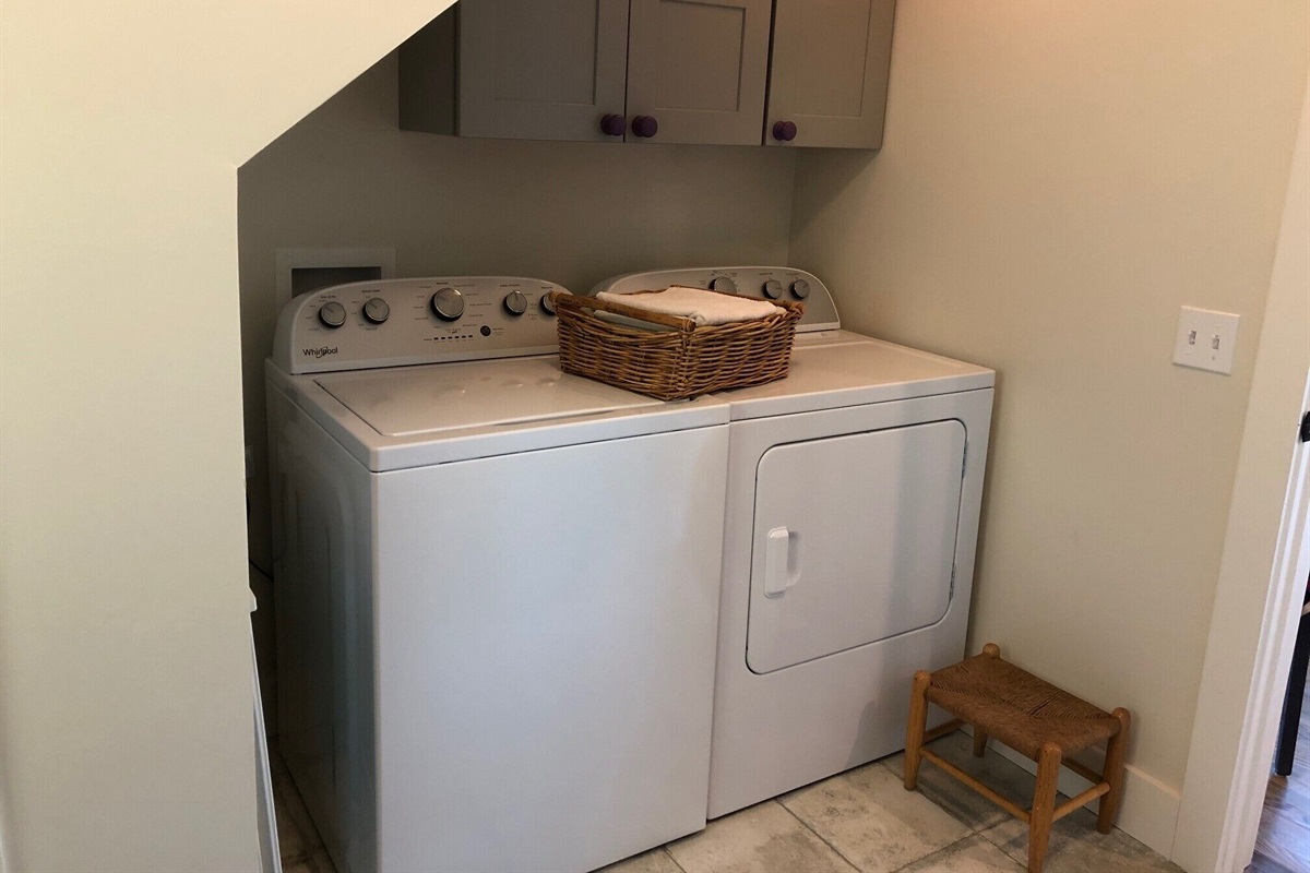 Washer & Dryer plus towels for going to the river/creek. Laundry detergent above