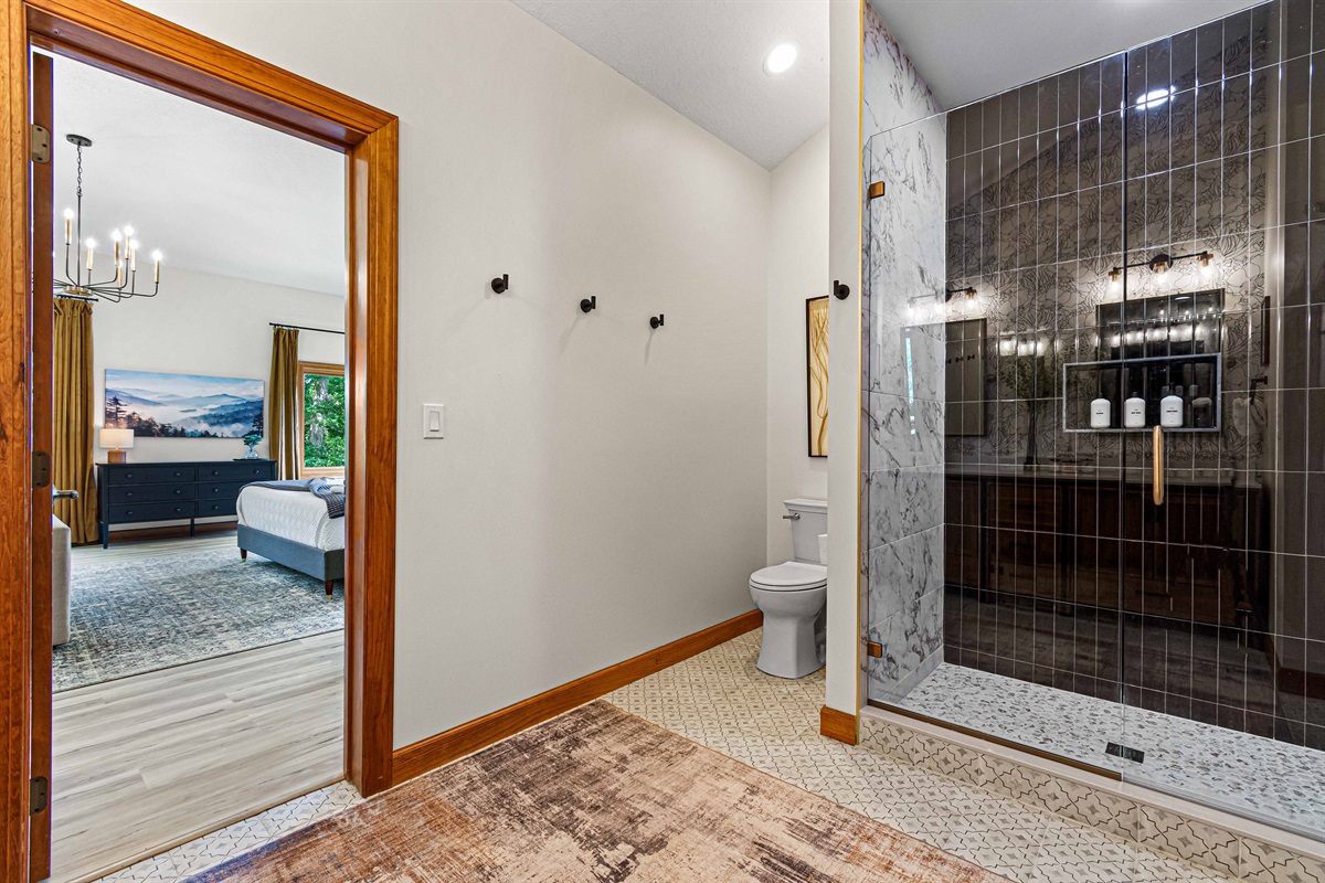 Step into the spa-inspired ensuite, where a glass walk-in shower, marble finishes, and luxury touches make your morning routine feel indulgent.🚿✨