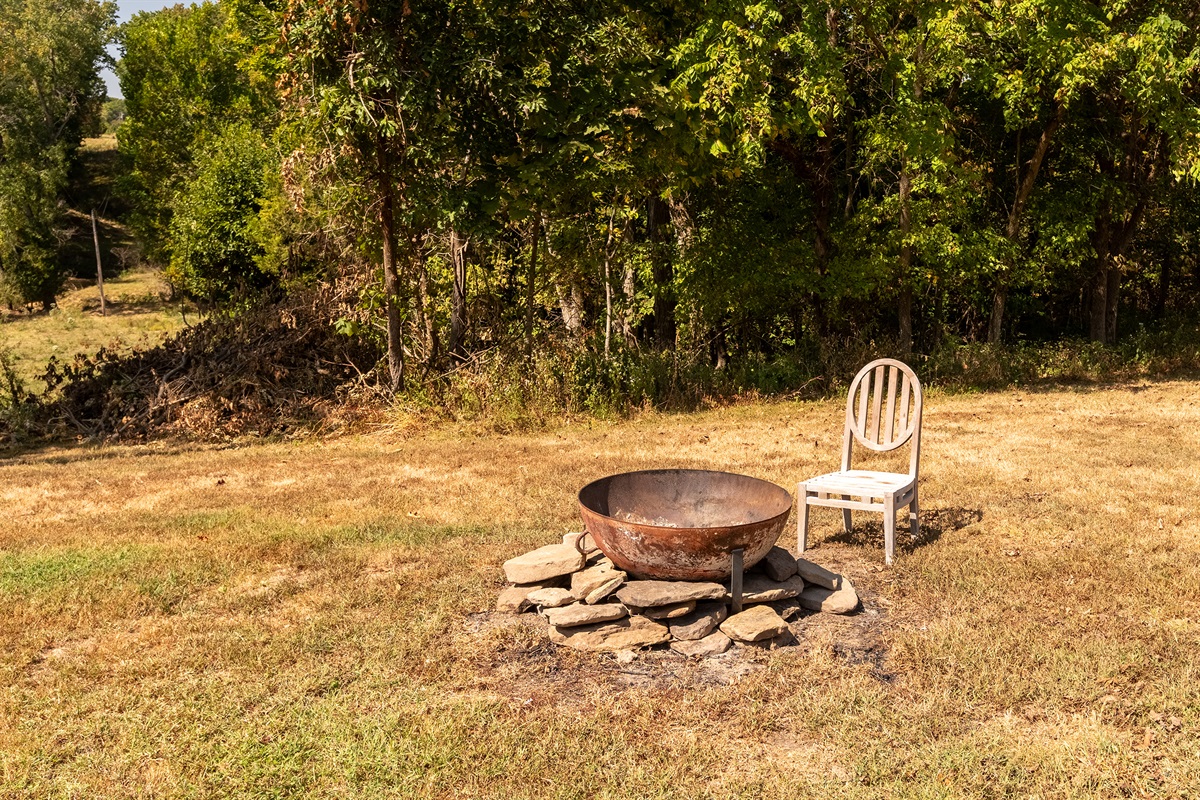 Cozy firepit area perfect for evenings under the stars and making s’mores.